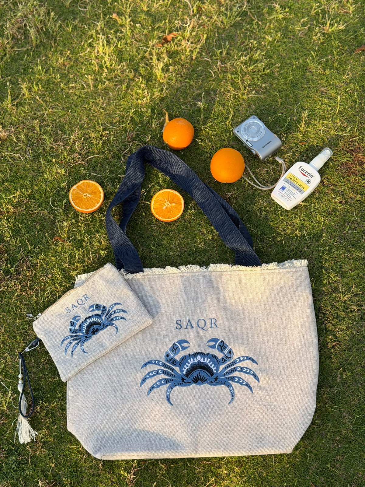 Natural linen tote bag with indigo crab motif and matching pouch
