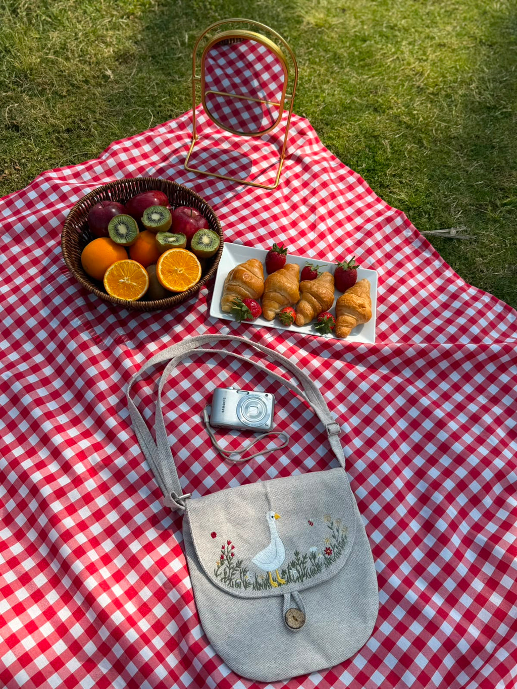 Grey linen crossbody bag embroidered with a goose and wildflowers