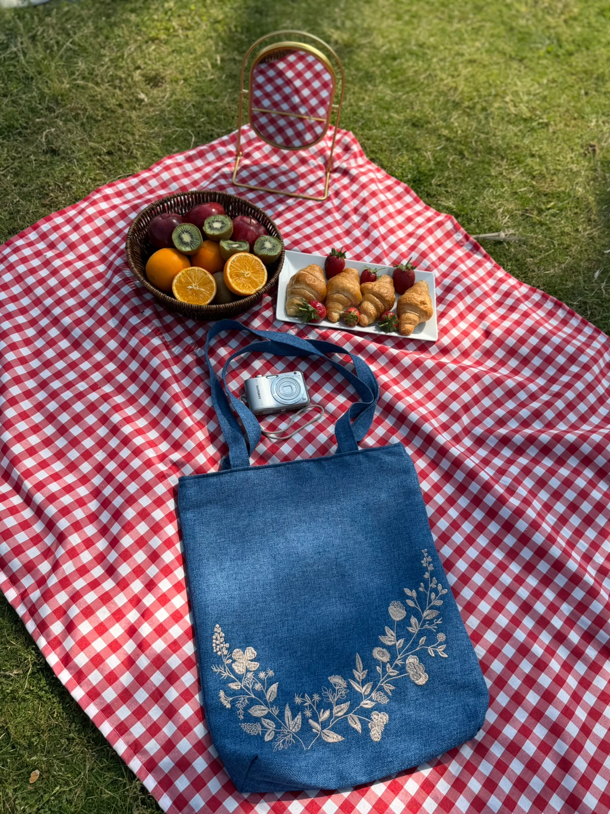 Denim blue tote bag with cream floral embroidery